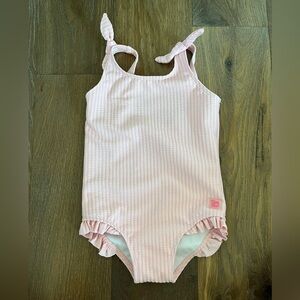 Girls pink ruffle butts bathing suit